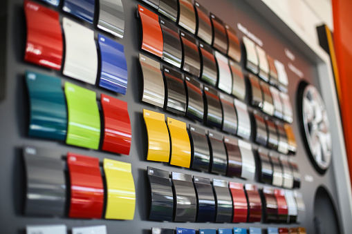 Metal color swatches in a car store.