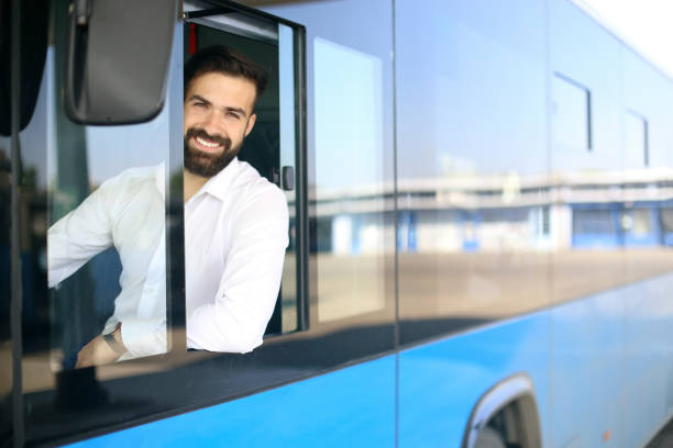 Smiling bus driver stock photo