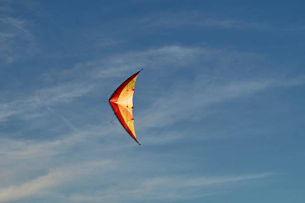 istock A colourful kite in the blue sky 1359337431
