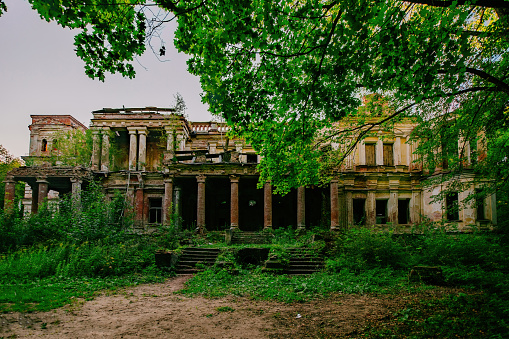 Old ruined overgrown abandoned mansion, aerial view. Former manor Stepanovskoe-Pavlishchevo, Kaluga region.