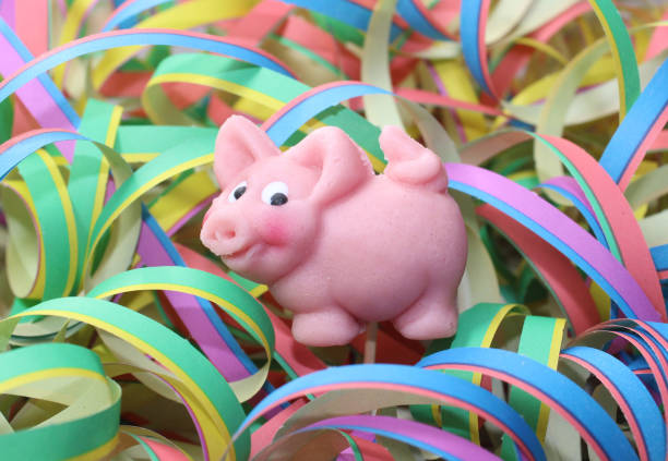 new year wishes with a marzipan pig and paper streamers