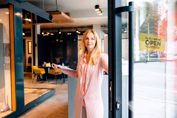 istock Woman in her new open modern store 1359344755