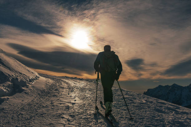 istock Ski tourism on snow road 1359344842