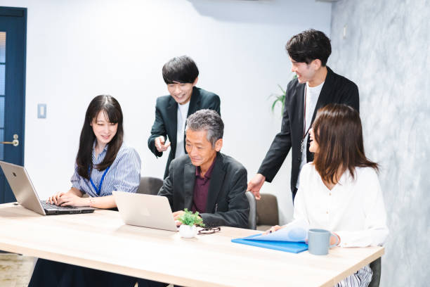 istock Office worker having a meeting in the office 1359348331