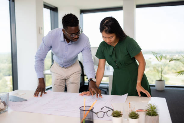 istock Diverse group of coworkers working in the office 1359348355