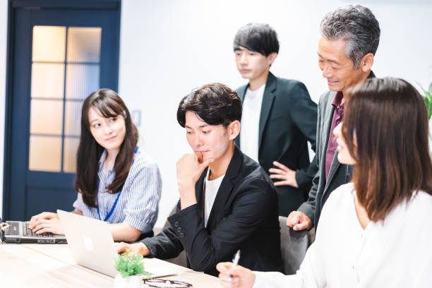 istock Office worker having a meeting in the office 1359348372