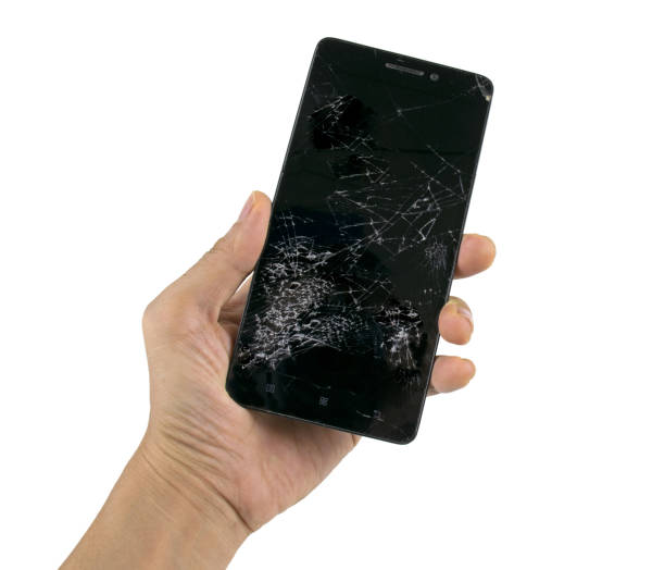 istock Black smartphone or mobile phone screen cracked,fractured or broken isolated on white background with clipping path. 1359349438