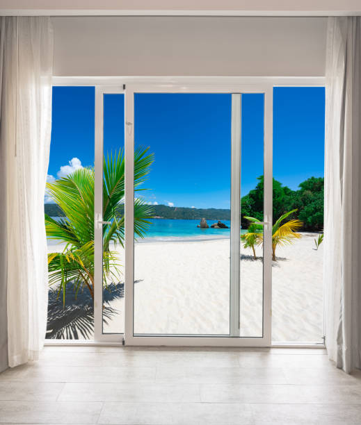 istock large glass door overlooking the beach 1359350809
