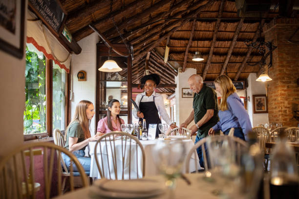 family arriving at a restaurant for lunch - couple restaurant day south america imagens e fotografias de stock