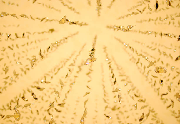 Low angle view of hanging crystal glass pieces from ceiling.