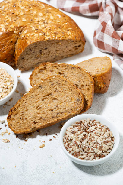 istock healthy bread with oatmeal and seeds, vertical 1359356642