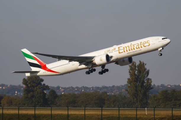 Emirates Airlines Boeing 777-300ER A6-EPT passenger plane departure and take off at Budapest Airport Budapest / Hungary - October 7, 2018: Emirates Airlines Boeing 777-300ER A6-EPT passenger plane departure and take off at Budapest Airport ept stock pictures, royalty-free photos & images