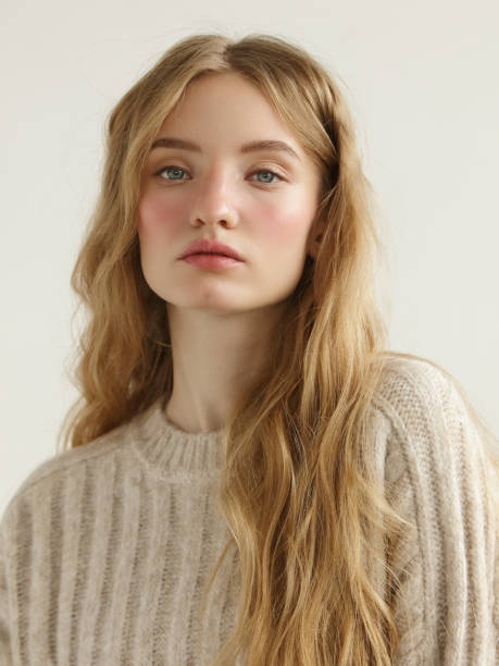 istock Young beautiful woman wearing beige sweater 1359362889