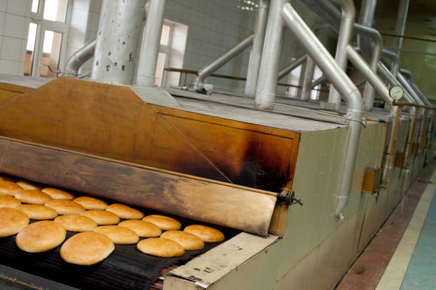 istock Bread conveyor line, on a factory 1359363016