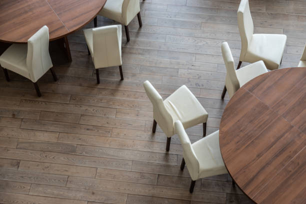 istock Abstract modern interior of cafe or meeting room with rounded armchairs 1359364018