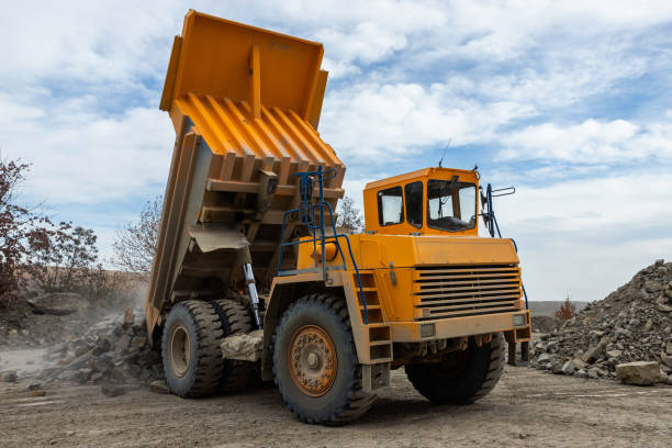 istock Large mining dump truck. Transport industry. Extraction of stone in an open pit 1359364062