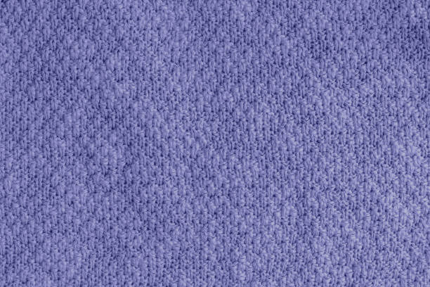 istock Very peri, violet knitted fabric texture background 1359367868