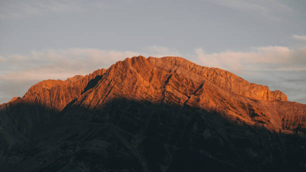 istock High mountains alpenglow orange color during sunset in the Pyrenees. 1359369499