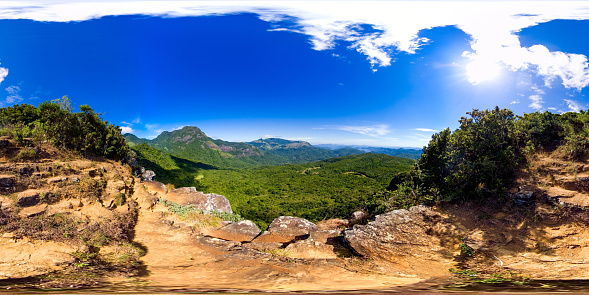 Mountains covered rainforest, trees and blue sky with clouds. Sri Lanka. Mini World's End, Pitawala Patana. Virtual Reality 360.