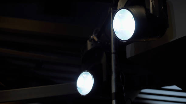istock Stage light on ceiling for a concert, nightclub or disco party. LED light device 1359372025