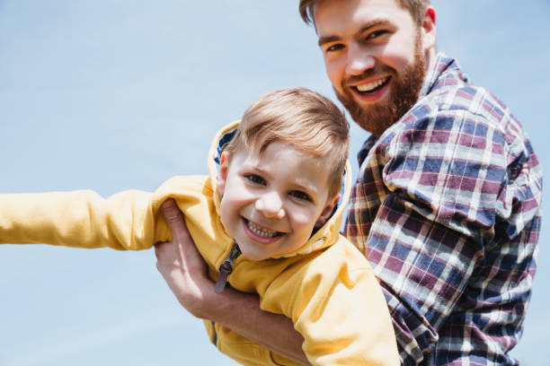 istock Happy father and his little son having fun together 1359373055