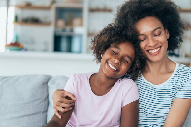 istock Mother and daughter at home 1359378136