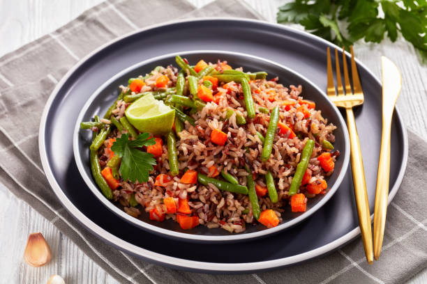istock fried brown rice with green beans and carrot 1359379389