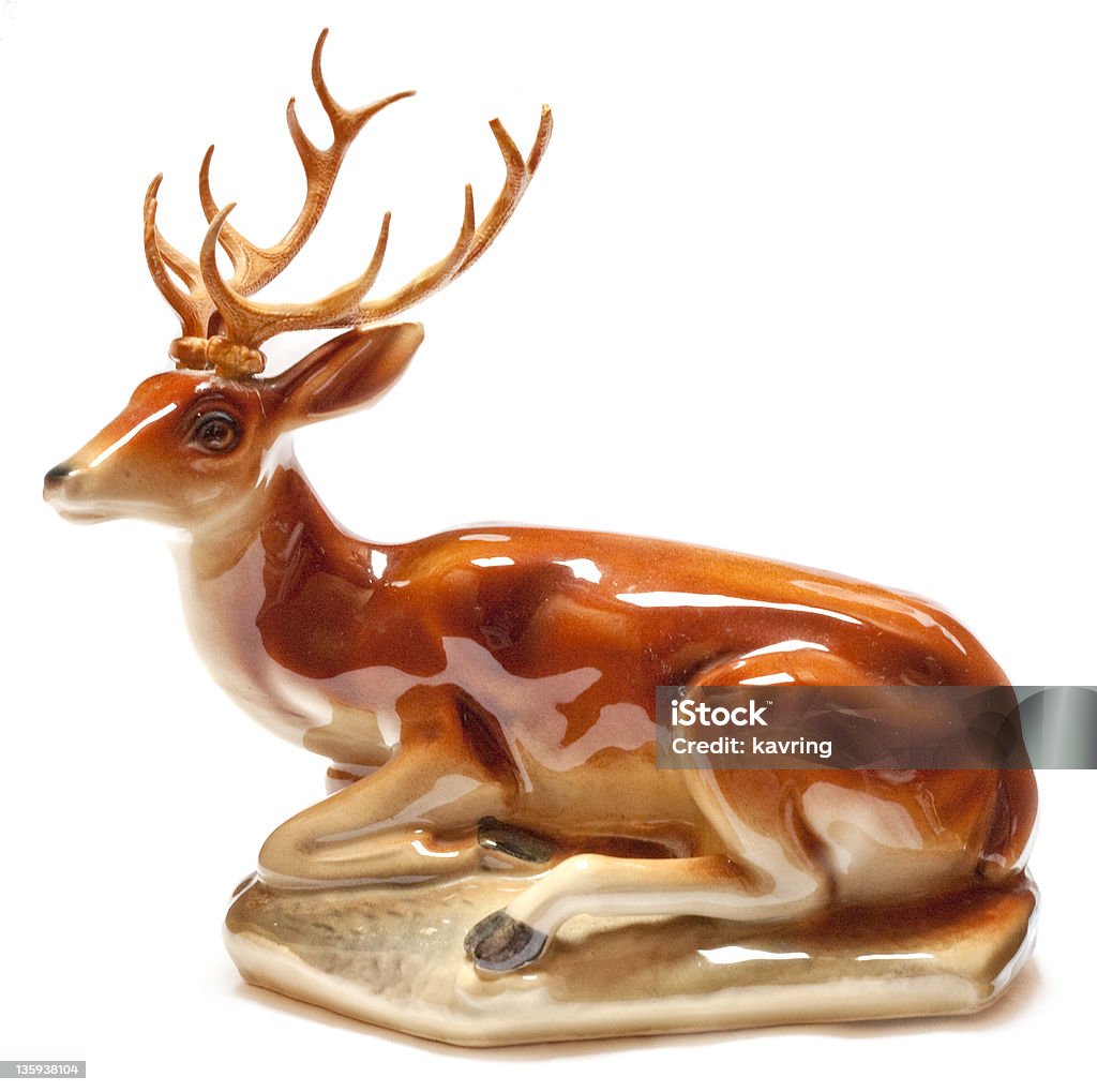 Statuette of a red deer Vintage statuett of a red deer isolated on white Deer Stock Photo