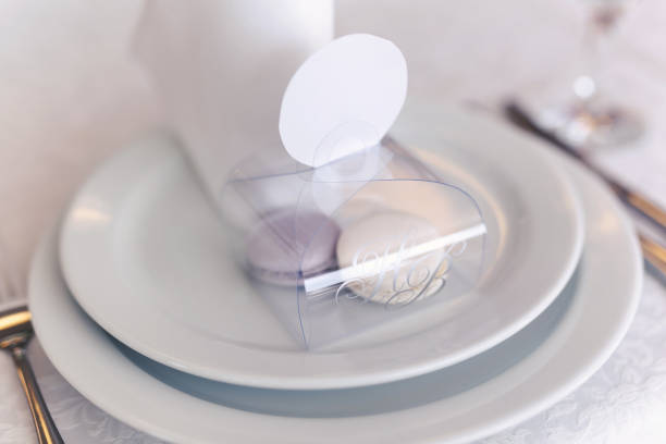 istock Serving a wedding banquet table in a restaurant with initials, name and date. 1359382154