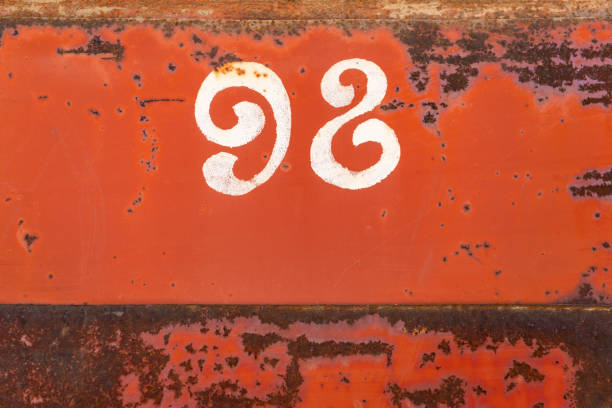 istock figures ninety-eight on rusty iron doors 1359382584