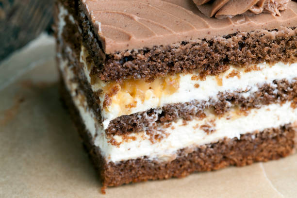 chocolate cake with caramel cream filling and hazelnuts, delicious cake with chocolate cream flavor with nuts
