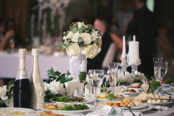 istock Served wedding banquet table with dishes in the restaurant 1359382900