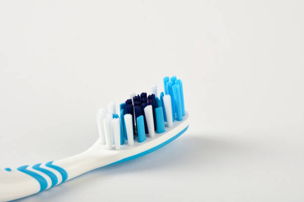 Close up clean and modern toothbrush on the white background
