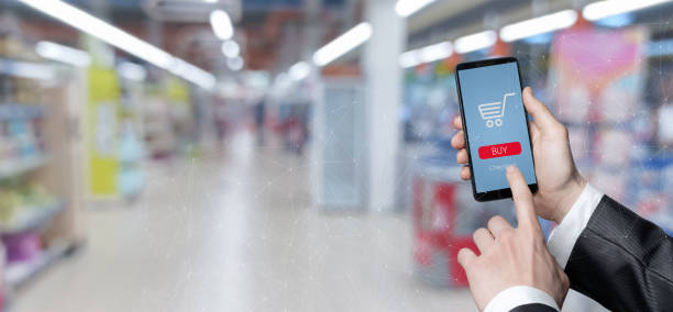 istock Concept of internet shopping with mobile devices . 1359384895