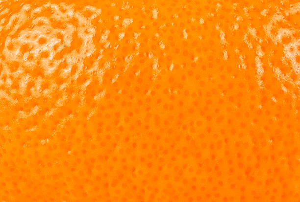 istock Ripe orange peel, as background. Close up view. Macro. 1359388001
