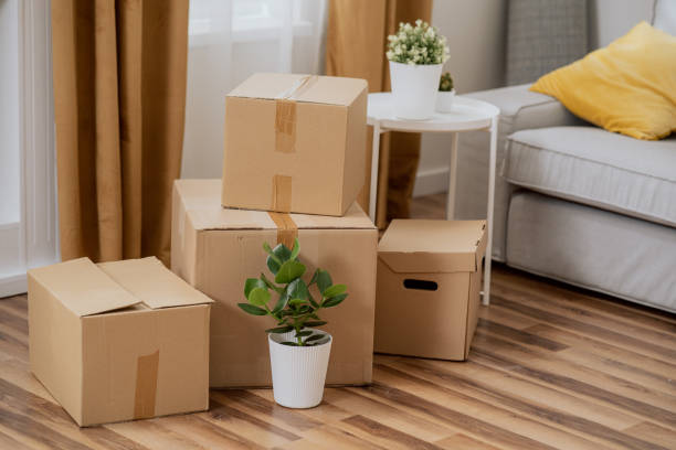 istock Moving in out, cardboard boxes with packed things, renting selling an apartment, changing location 1359391629