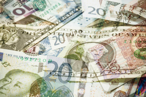 istock Money banknotes background. Different currency bills. 1359400141