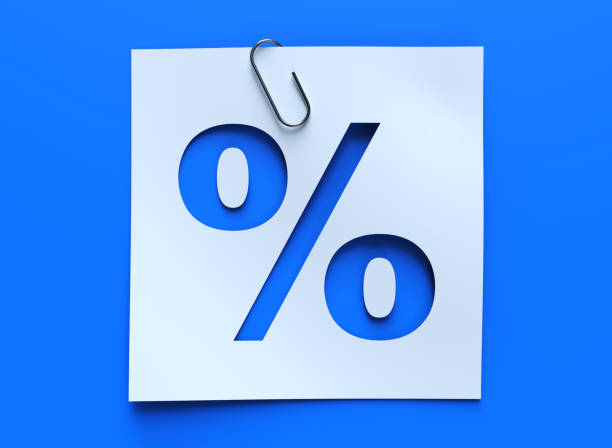 istock Percentage sign on blue background 1359400914