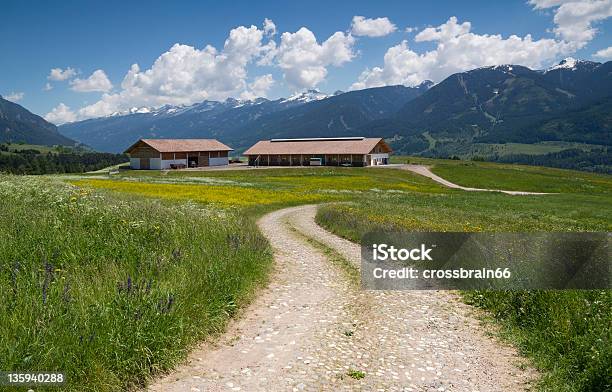 Winding Road To Mountain Farm Stock Photo - Download Image Now - Blue, Cloud - Sky, Cobblestone