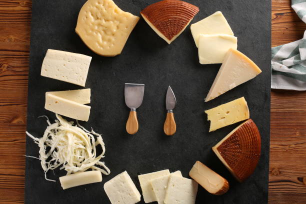 istock Various types of cheese with empty space background stock photo 1359403335