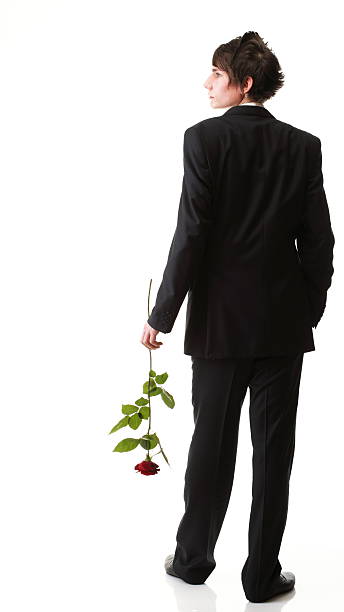 istock Young man, flower, red rose isolated 135940729