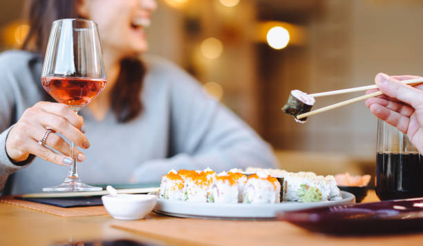 istock Friends enjoying meal 1359408291
