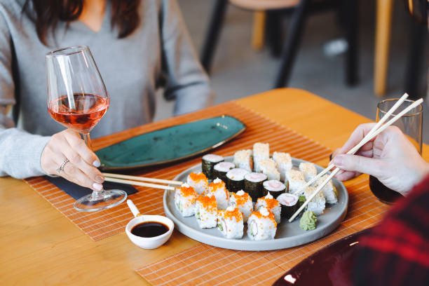 istock Friends enjoying meal 1359408309