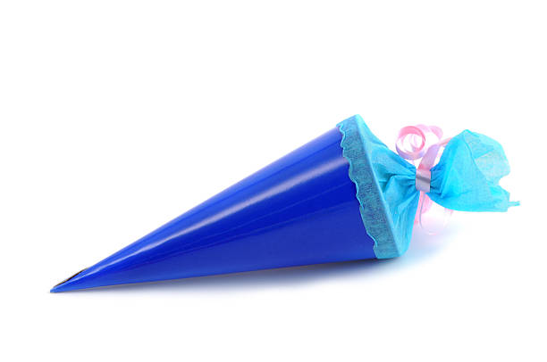 blue Conical bag of sweets blaue Schultuete zur Einschulung - Conical bag of sweets zuckertüte stock pictures, royalty-free photos & images