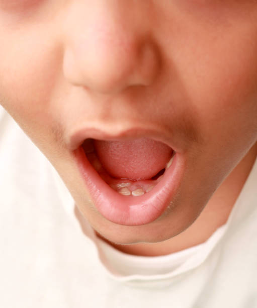 istock child, tooth, pediatric dentist 1359408933