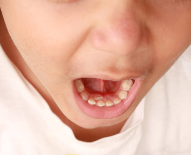 istock child, tooth, pediatric dentist 1359408940