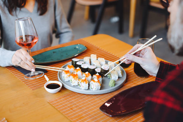 istock Friends enjoying meal 1359408954