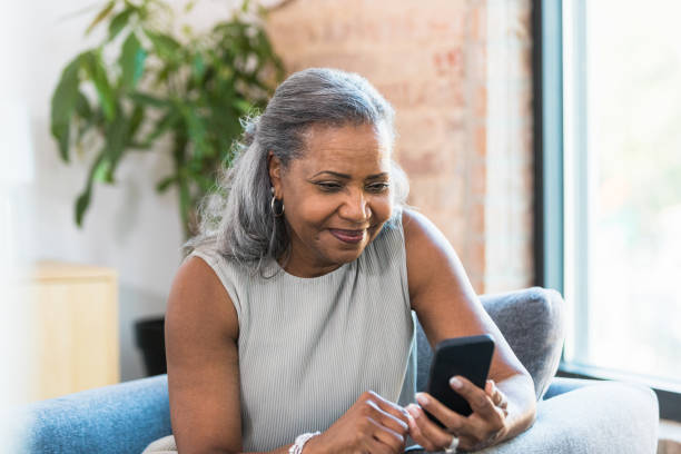istock Taking a break from work, business woman surfs net 1359410957