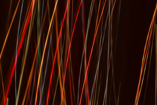 istock Bright multicolored diagonal and vertical lines of rays on. Abstract dark banner background. 1359412099