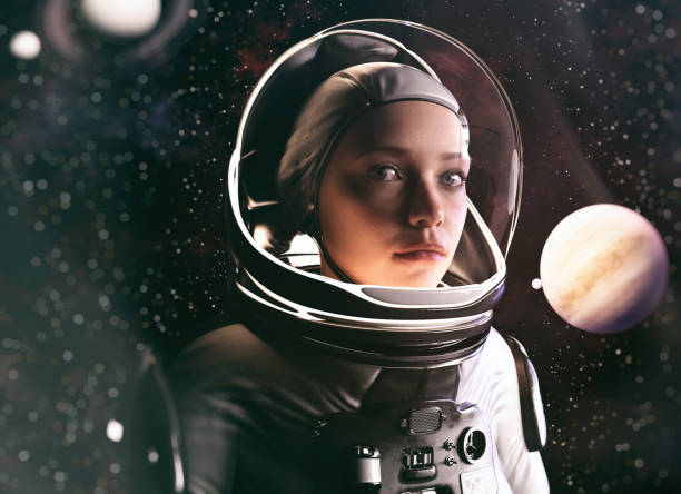 istock Young female astronaut front of jupiter and saturn. 1359413546